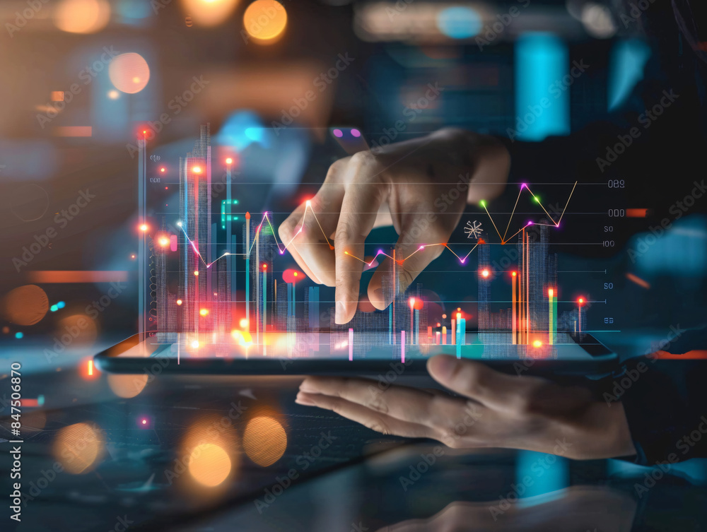 Hand touching a tablet with glowing data and graphs with copy space ...