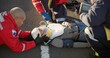 © CineLens/peopleimages.com - Paramedic, oxygen and outdoor with patient, healthcare and rescue of breathing, service or ambulance for person. EKG monitor, accident or injury on street, pulse oximeter and EMS with victim in USA