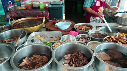 Wall Mural - Local duck noodle on street food shop chef cook cooking various spicy food, Asian duck noodles.