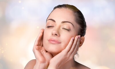 Poster - Portrait of happy woman touches face with clean skin