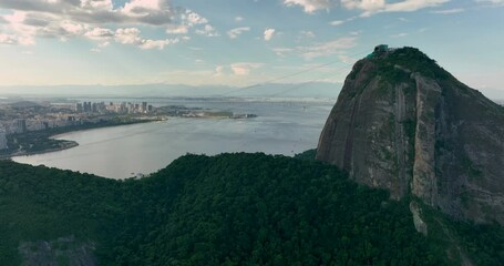 Wall Mural - Flying up to the top of the Sugar Loaf mountain at late afternoon light, Rio de Janeiro