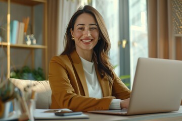 Wall Mural - Young business woman at desk  teaching online classes.