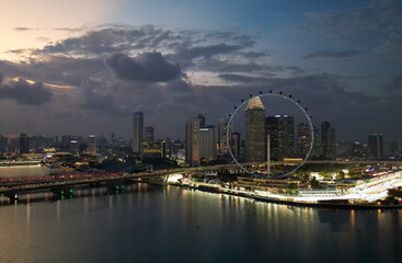 Wall Mural - Sunset aerial view of Marina Bay and Singapore skyline