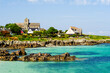 © Cavan Images - seaside church and buildings on the isle of iona
