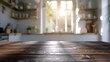 © AkuAku - Blurred modern kitchen interior background with daylight flare and a lovely vacant dark wooden table top