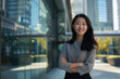 © song - Smiling Asian Office Lady in Office Building Background