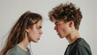 © mohammad - A young couple is arguing, with both angry expressions, white photo studio background, Ai generated Images