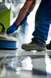 © Shooting Star Std - Professional Photography of a janitor using a floor buffer to shine office tiles, Generative AI