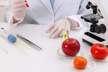 Wall Mural - Quality control. Food inspector checking safety of products in laboratory, closeup