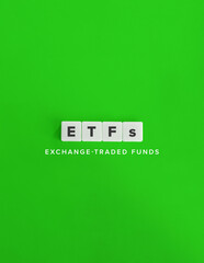 Wall Mural - Exchange-traded Funds (ETFs) Banner. Text on Block Letter Tiles and Icon on Flat Background. Minimalist Aesthetics. Letter size Format. 