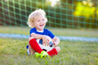 © famveldman - France football fan kids. Children play soccer.