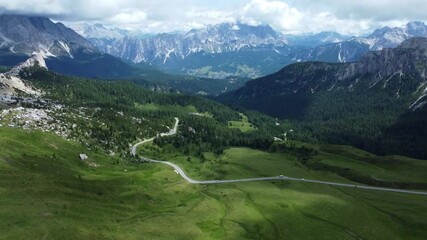 Wall Mural - Drone Aerial Flight Over Majestic Mountain Peaks Dolomites, Italy
