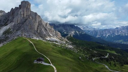 Wall Mural - Drone Aerial Flight Over Majestic Mountain Peaks Dolomites, Italy