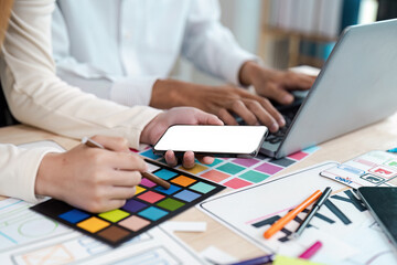 Wall Mural - creative ux ui design process with mobile app interface and logo concept on desk