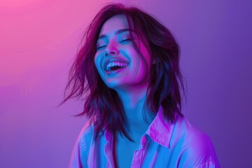 Female fashion model in cotton shirt smiling in neon light.
