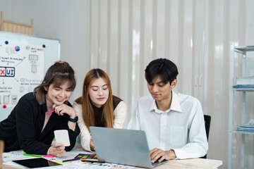 Wall Mural - young creative team collaboration on ux ui design project in modern office environment with laptops 