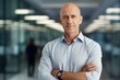 © CogniLens - Portrait of a glad man in his 50s donning a classy polo shirt over sophisticated corporate office background