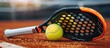 © RMedia - padel tennis racket on a padel court with a ball
