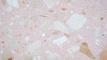 Aufkleber - A pink and white stone wall with a lot of small rocks. The wall is very textured and has a lot of detail