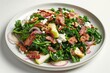 © Mayatnikstudio - Delicious Warm Pecan-Crusted Goat Cheese on Wilted Greens and Bacon