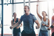© DoneDeal/peopleimages.com - Fitness, man and scream to celebrate success in exercise class, workout and training goals. Sports, people and happiness for power challenge, winner or performance achievement at health club or gym