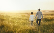 © Lyndon/peopleimages.com - Back, outdoor and father with son, walking or adventure with sunshine, getaway trip or bonding together. Family, single parent or dad with kid, field or childhood with weekend break, nature or travel