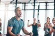 © peopleimages.com - exercise, people and scream to celebrate success in workout class, fitness and training goals. Sports, man and happiness for power challenge, winner or performance achievement at health club or gym