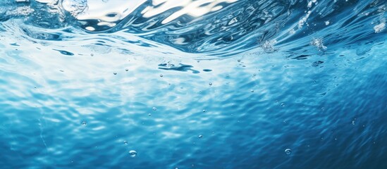 Aufkleber - Closeup blur abstract of surface blue water Abstract of surface blue water reflected with sunlight for background Top view of blue water Water splashed use for graphic art. Creative banner