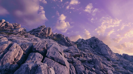 Wall Mural - Scenic rocky mountain landscape with dramatic cloudy sky at sunset