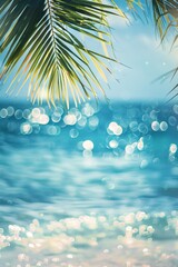 Wall Mural - Palm tree leaf is hanging over sparkling turquoise blue ocean water