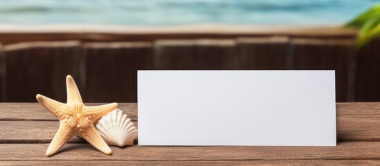 Sticker - White Blank business card for branding and starfishes on wooden background Creative Mockup for presentations and corporate identity Travel Company. Creative banner. Copyspace image