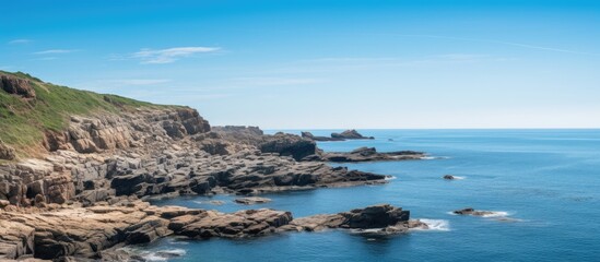 Wall Mural - Clear sky with sea and rocks. Creative banner. Copyspace image
