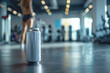 © Sergio - Aluminum can sitting on floor in a modern gym