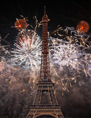 Wall Mural - Eiffel tower with fireworks at night  in Paris, France. The Eiffel tower is the most visited touristic attraction in France