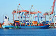 © Unkas Photo - Container and bunker ship under port crane