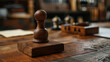 © standret - Closeup of a notary public wooden stamp on a desk