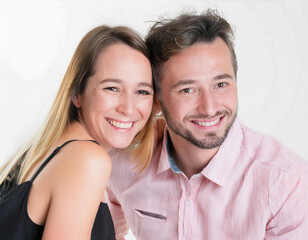 Wall Mural - Beautiful young blonde woman smiling with handsome man bearded in white background