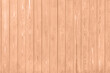 © New Africa - Wooden surface of peach fuzz color, top view. Trendy shade of 2024 year