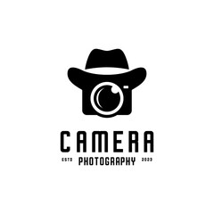 Camera logo, hat above camera