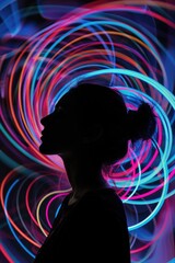 Sticker - A woman stands in front of a vibrant light installation, perfect for use in articles about art, culture, or technology