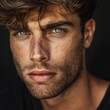 © Vlad - Male Model Isolated. Portrait of a Beautiful and Photogenic Man with a Serious Expression, Dark Background