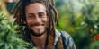 © Anastasiia - Content man with dreadlocks enjoying cannabis. Concept Cannabis, Marijuana, Dreadlocks, Relaxation, Lifestyle