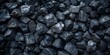 © Anastasiia - Aerial view of black coal pile texture with space for text in the background. Concept Coal Pile, Aerial View, Text Space, Background Texture