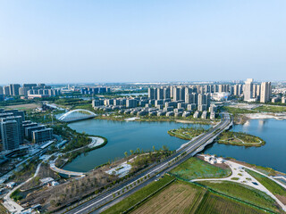 Poster - view of lake and moden city