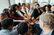 © Jacob Lund - Group of diverse people with teamwork and inclusion at a conference setting