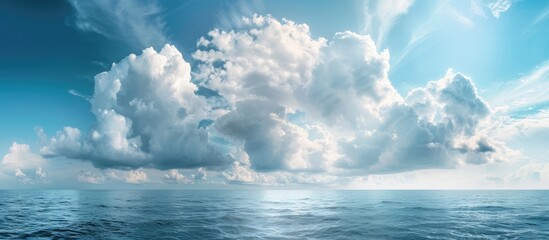 Beautiful seascape with clouds on a sunny day captured in panoramic view.