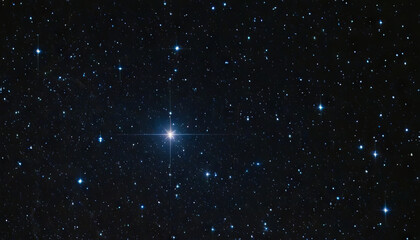 a single, bright star shines in the center of the image, surrounded by a field of smaller, twinkling