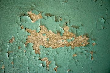 Wall Mural - Old paint on the wall.A photo of a wall with peeling paint. Vintage background of the building.