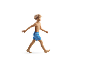 Poster - Boy walking in swimming shorts