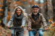 © Ravil Sayfullin - Happy old couple cycling mountain bikes on a sunny day